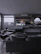 Modern lounge area showcasing the Salone sofa with minimalist decor and black accents.