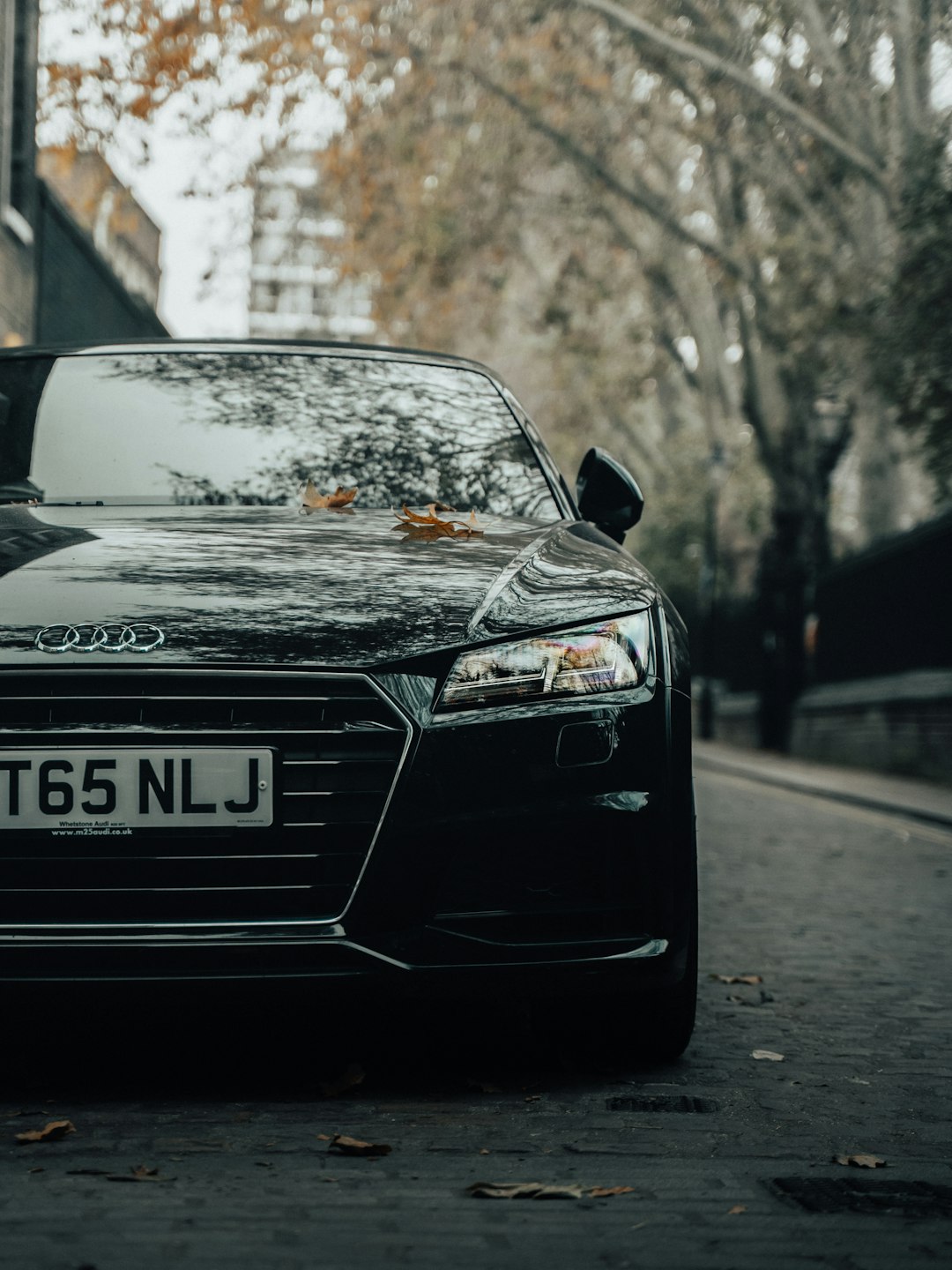 black audi a 4 on road during daytime