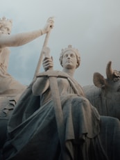 low angle photography of statue of man