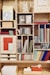 books on brown wooden shelf