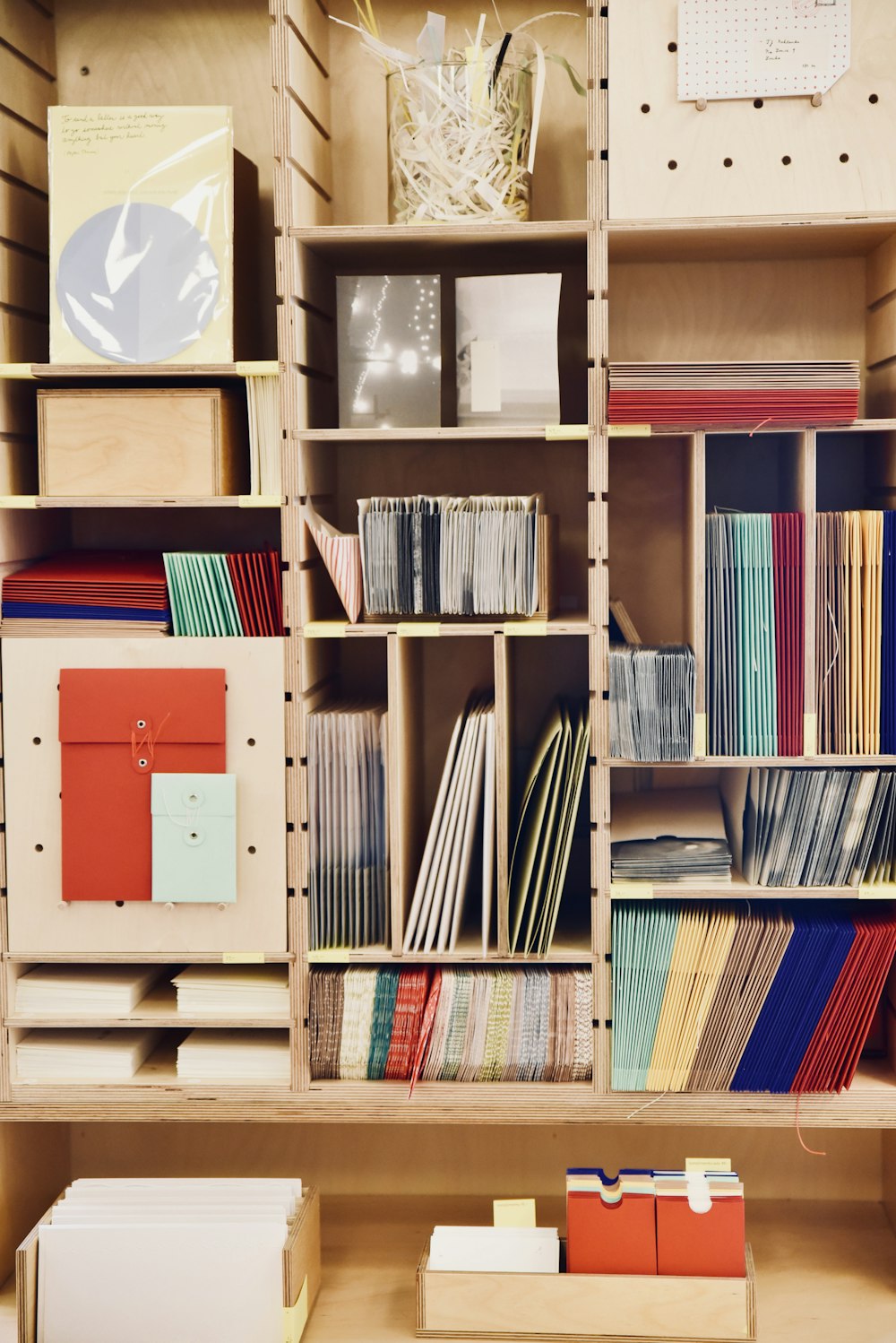 books on brown wooden shelf