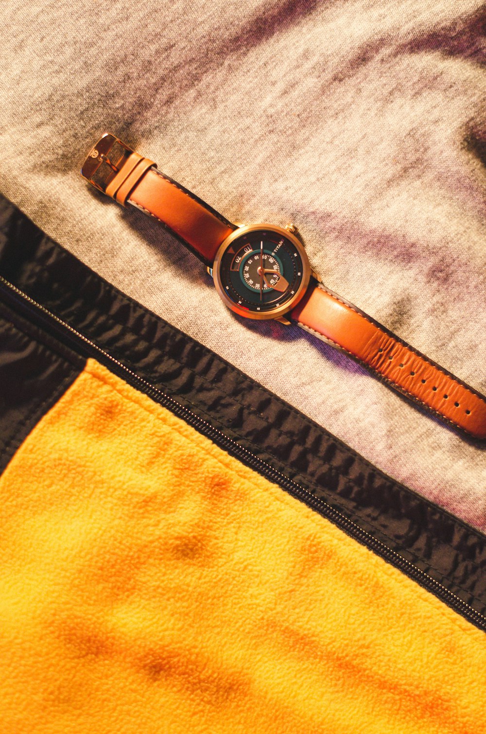 black leather strap gold round analog watch