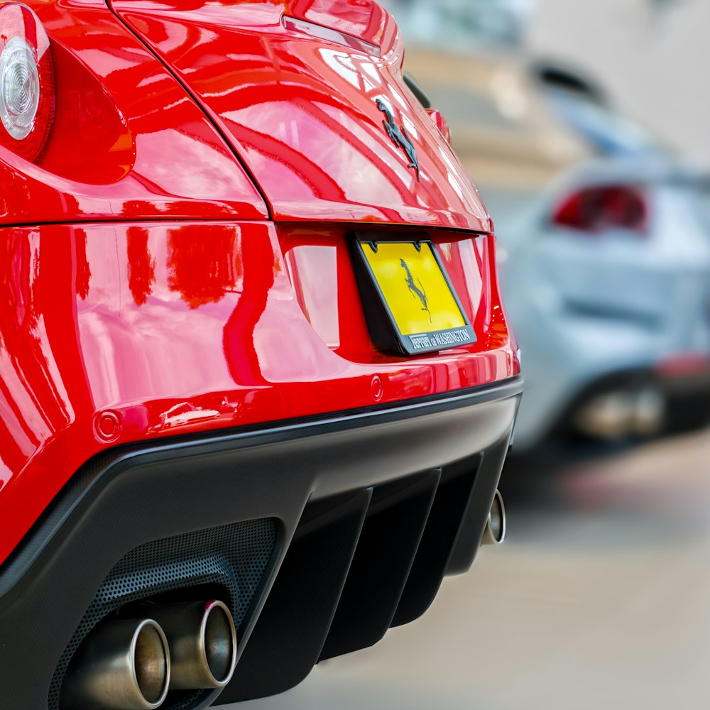 red and black porsche 911