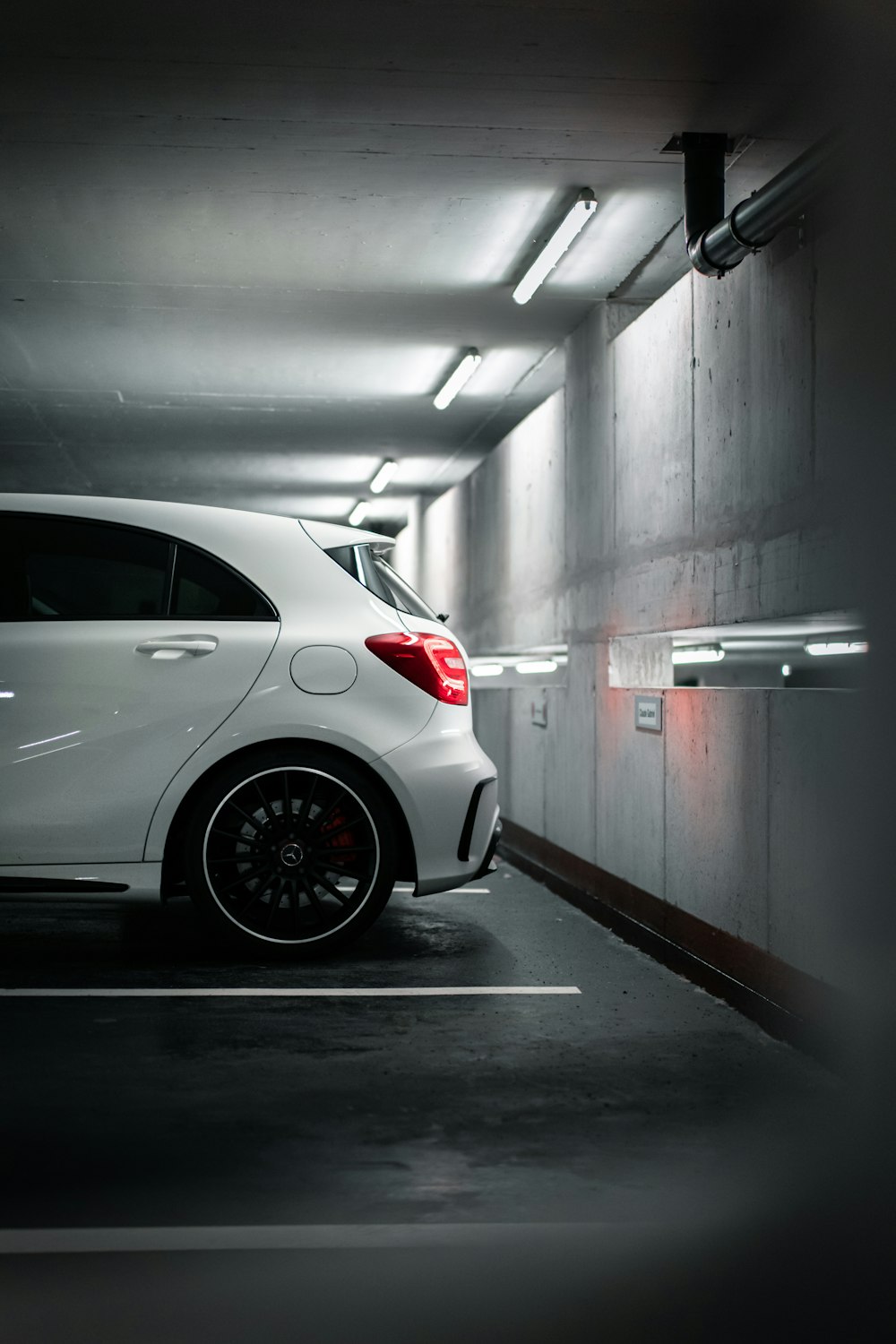 white car in a tunnel