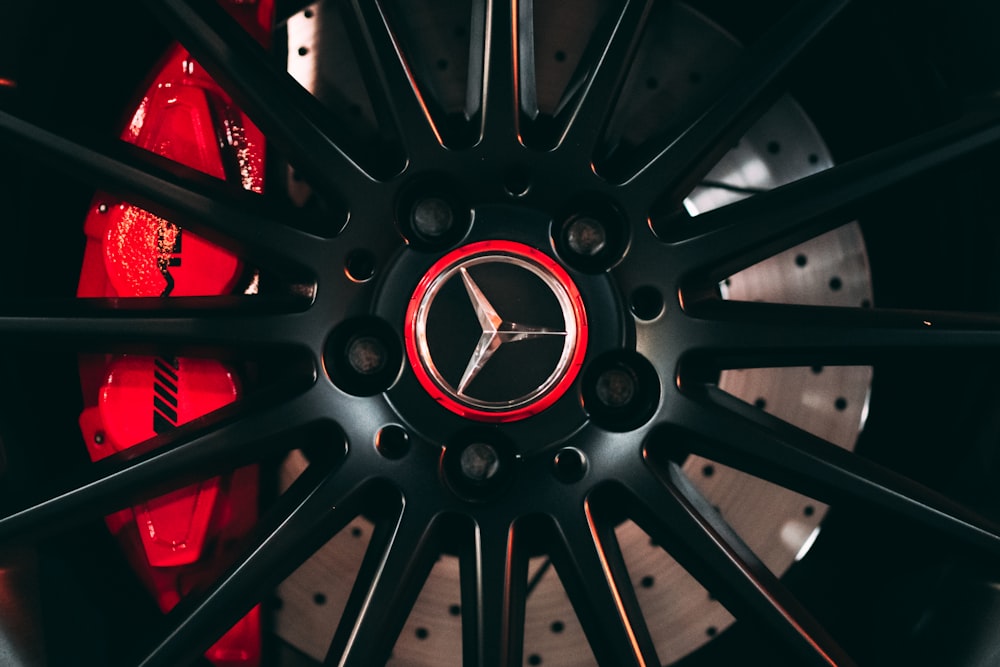 black and red wheel with tire