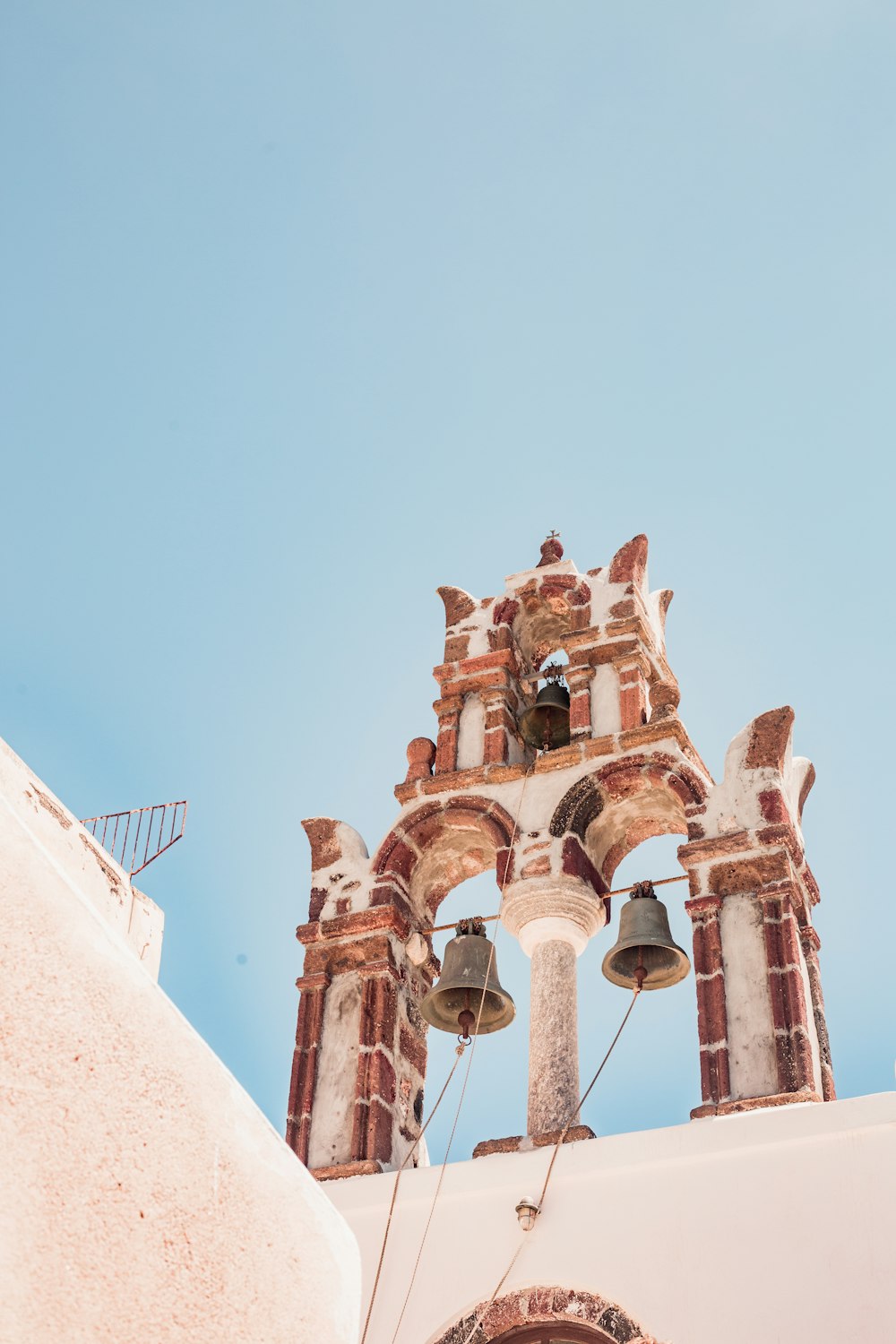 brown concrete tower under blue sky during daytime