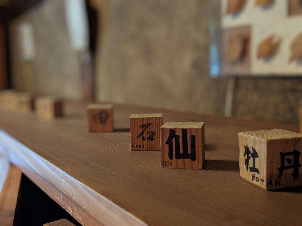 brown wooden blocks on brown wooden table