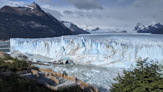 white ice on body of water during daytime