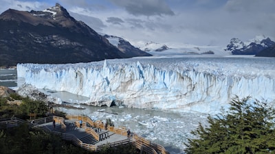 white ice on body of water during daytime