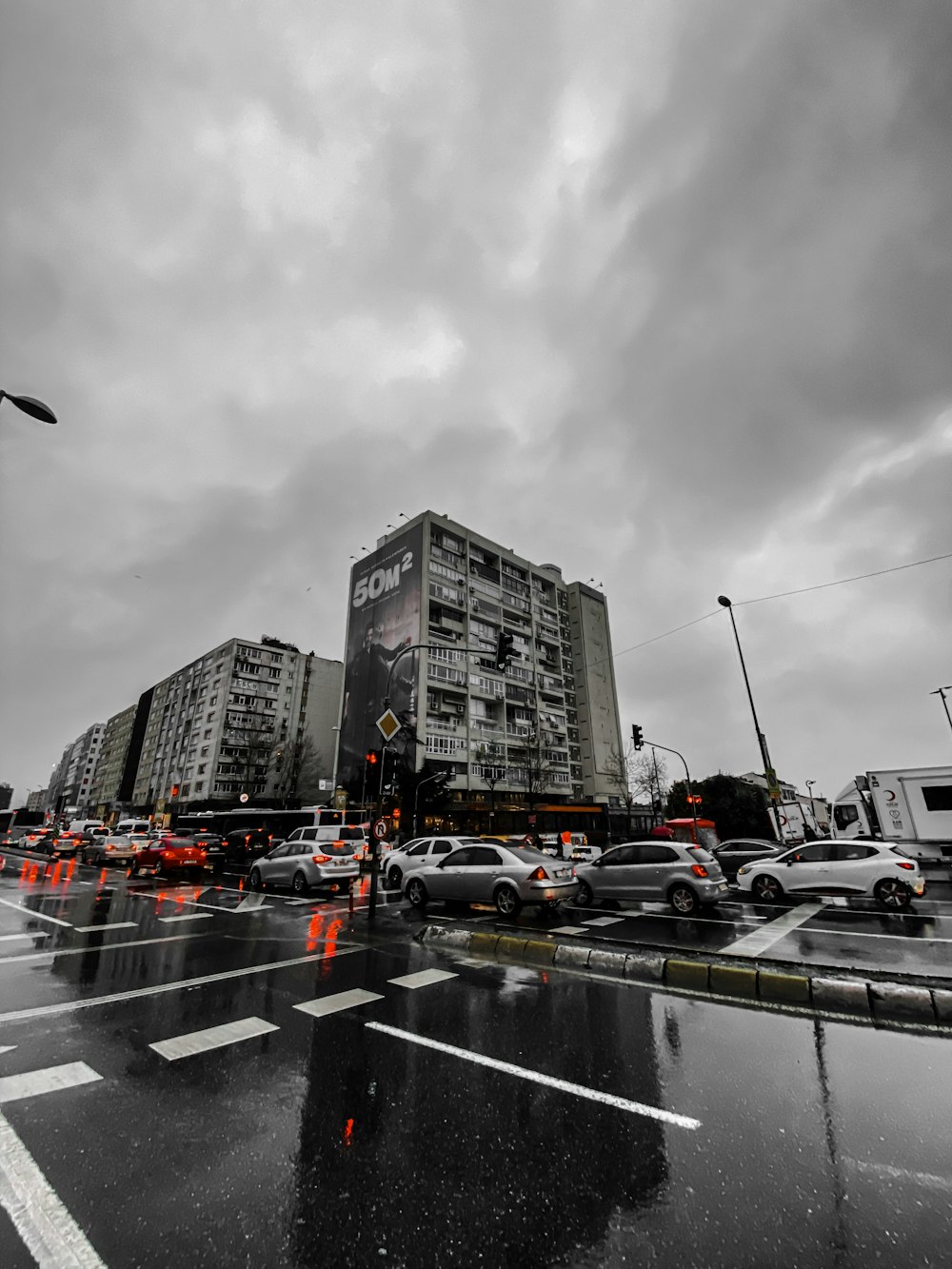 cars on road near buildings during daytime