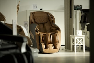 brown and black leather backpack on white wooden table