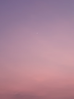 Elegant celestial chart with soft pastel tones and cosmic symbols.