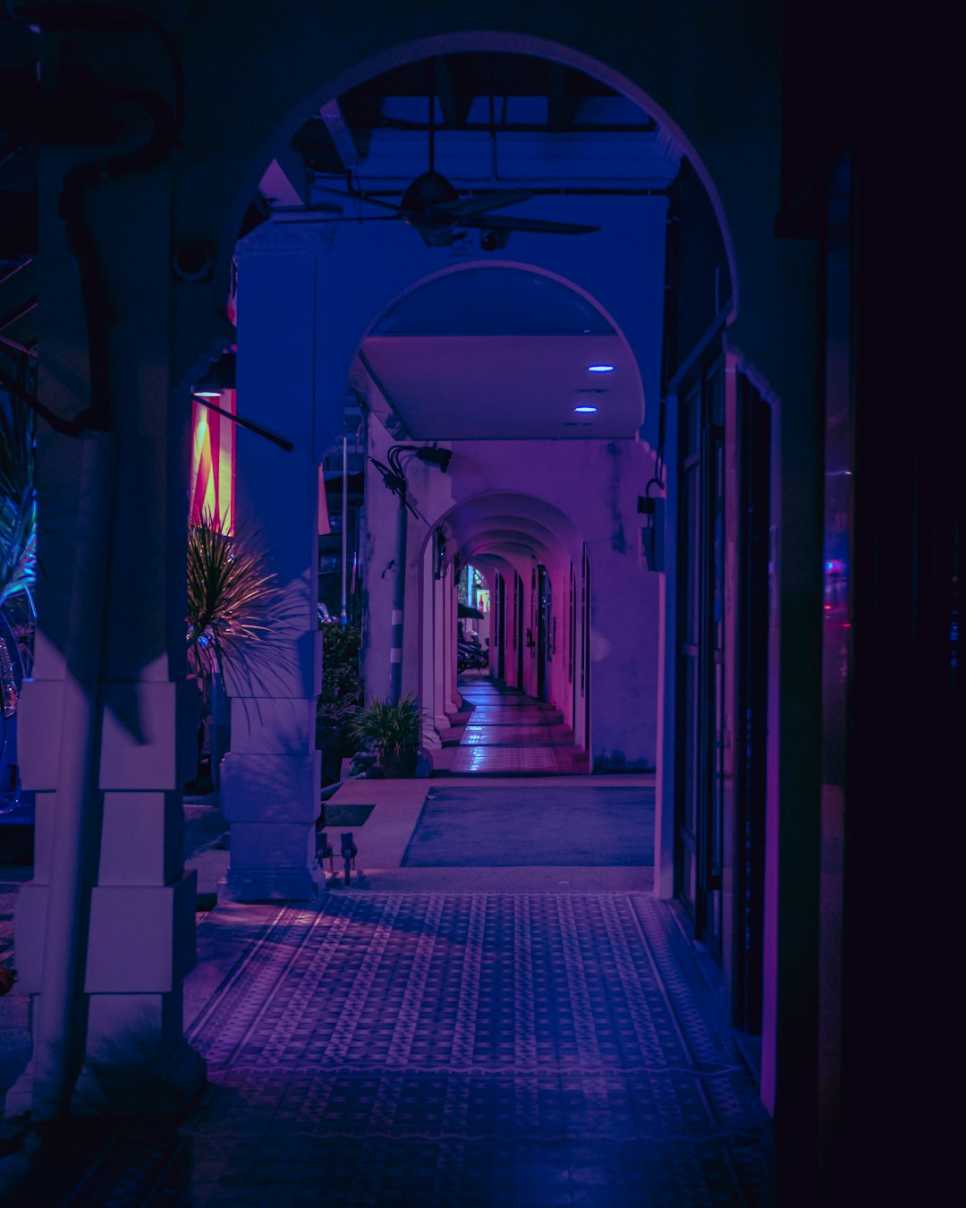 hallway with blue and red lights