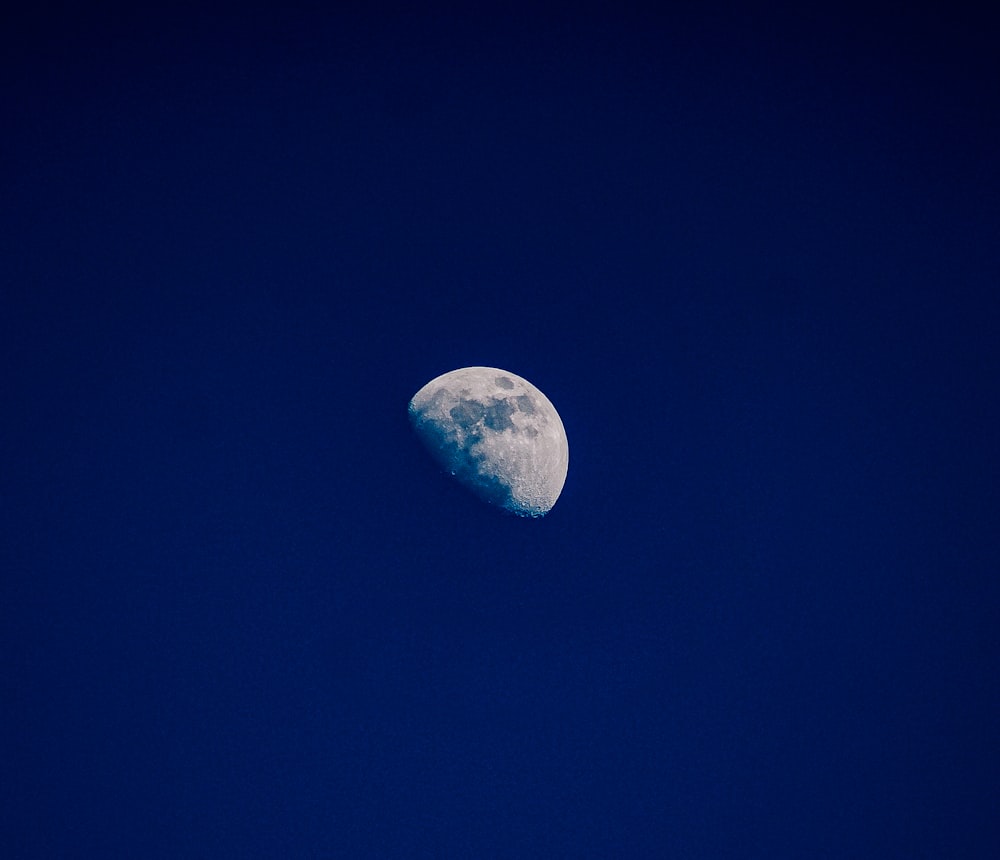 full moon in blue sky