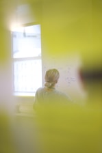 girl in yellow long sleeve shirt