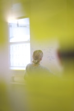 girl in yellow long sleeve shirt