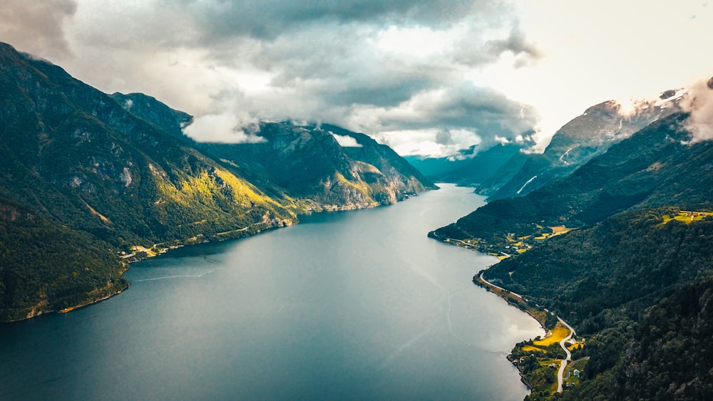 lake in the middle of mountains