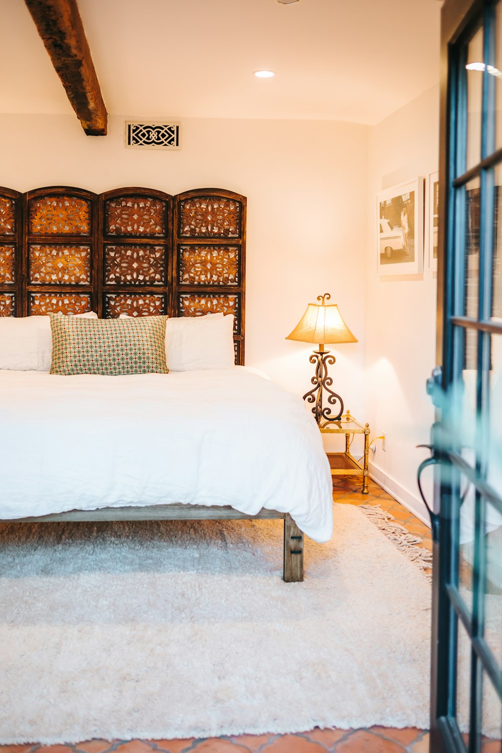 white bed linen on bed