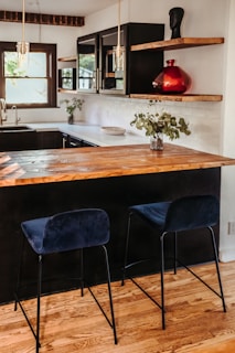 black chair beside brown wooden table