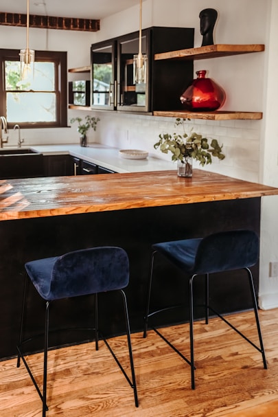 black chair beside brown wooden table