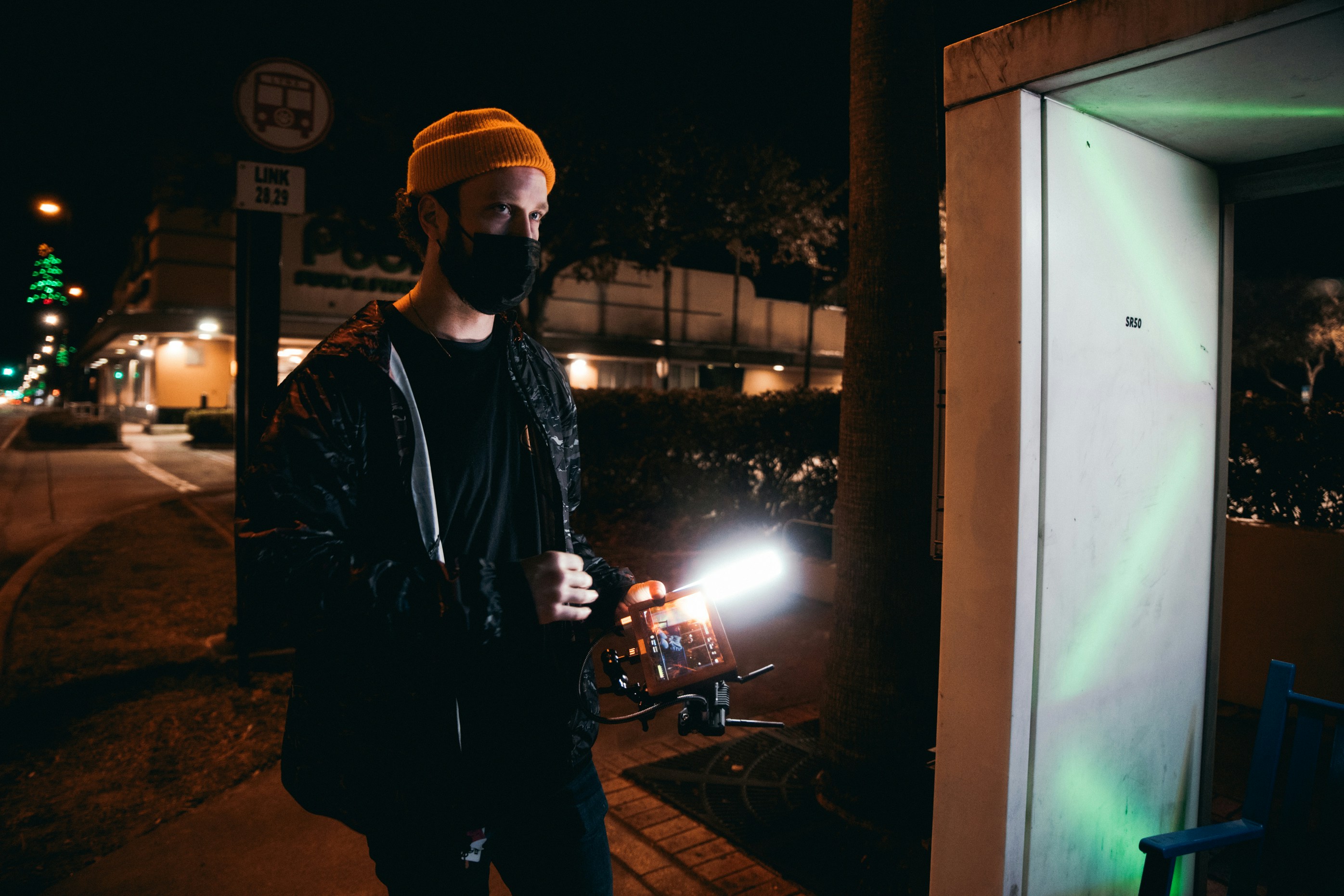 man in black shirt standing beside man in black shirt photo – Free Lighting Image on Unsplash