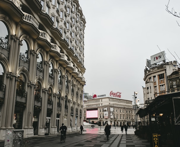 people walking on street near building during daytime