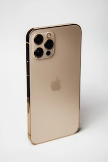 silver iphone 6 on white table