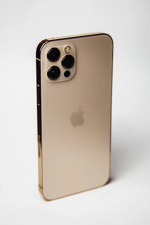 silver iphone 6 on white table