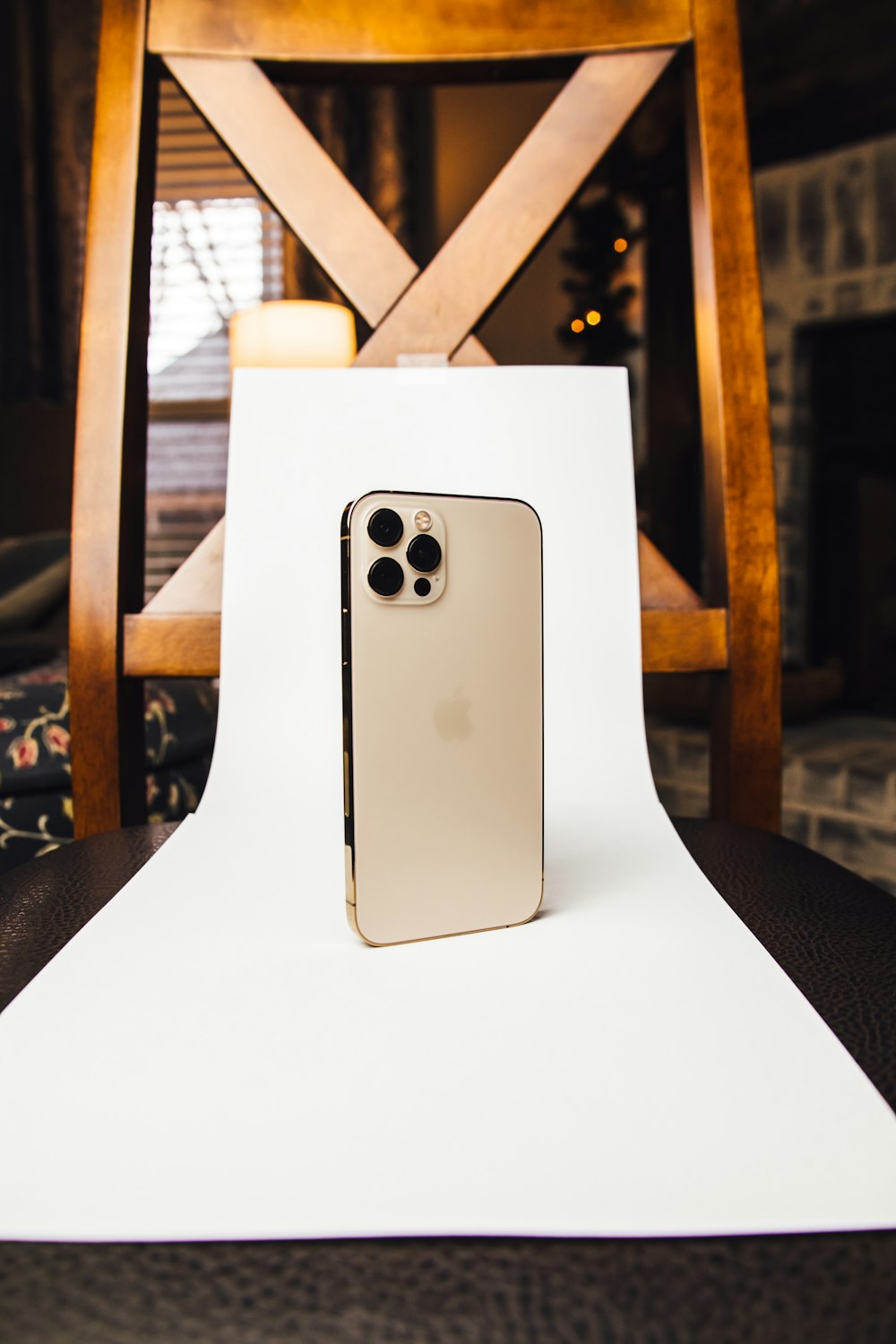 white and black iphone case on white chair