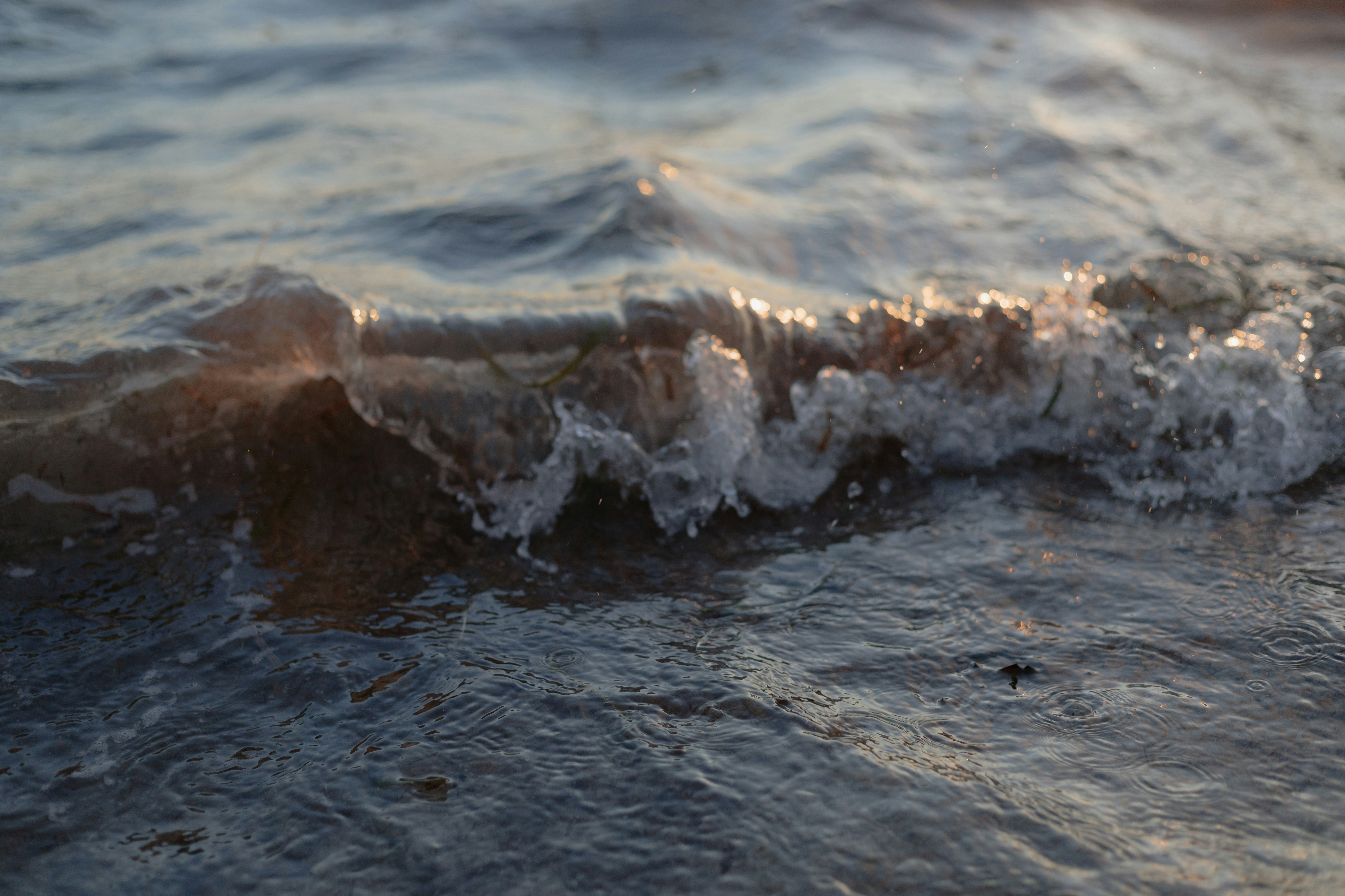water splash on brown sand
