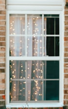 Modern window frame installation in a cozy home setting