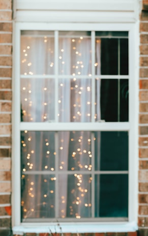 Modern window frame installation in a cozy home setting