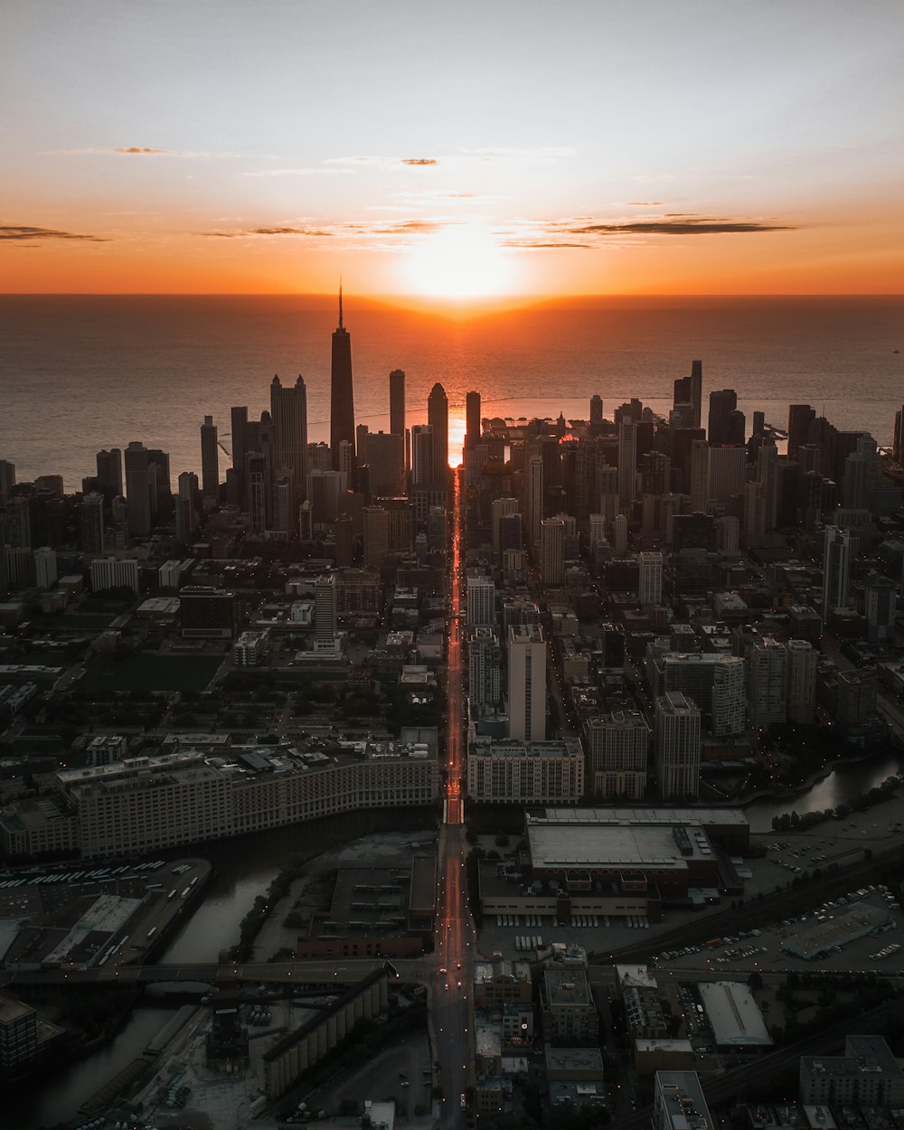 aerial view of city buildings during sunset