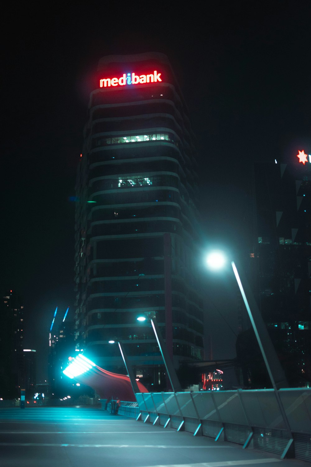 red and black lighted building during nighttime