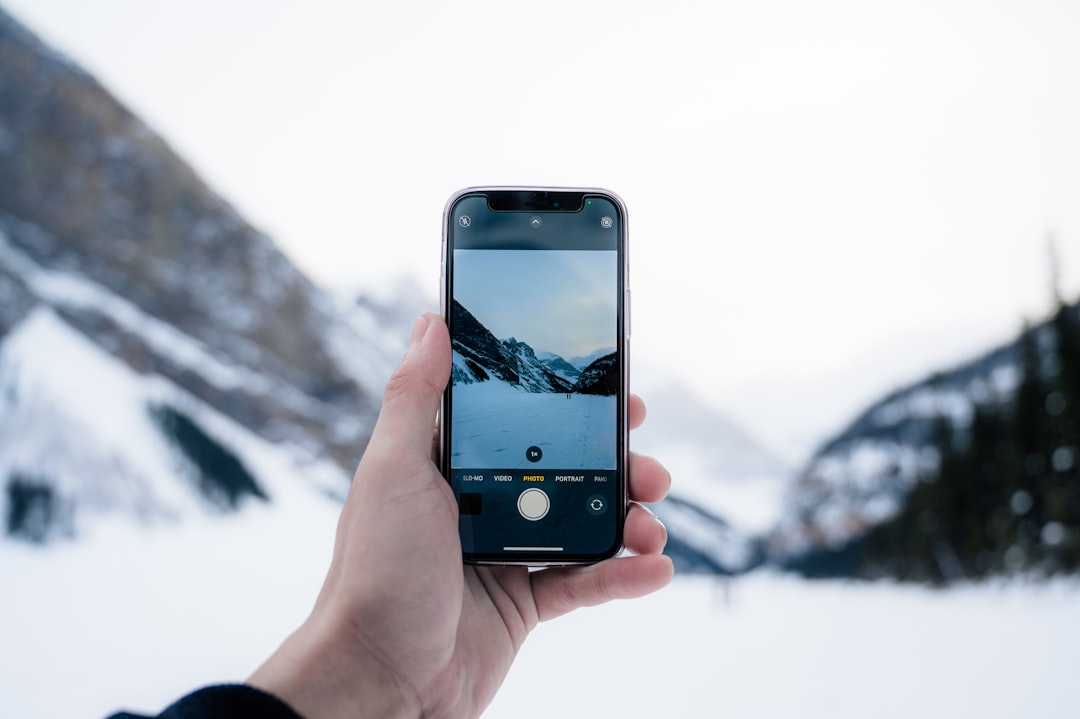 person holding black iphone 5