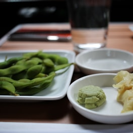 green vegetable on white ceramic bowl