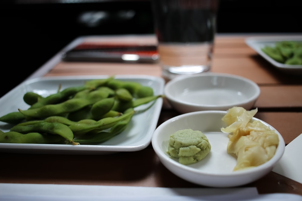 green vegetable on white ceramic bowl