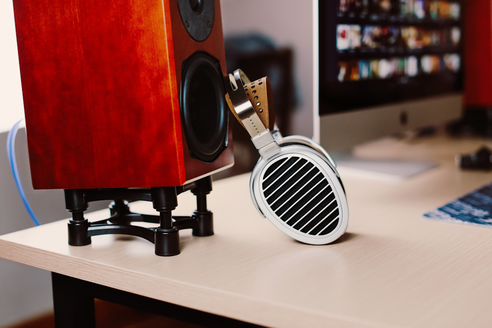 black and red speaker on white table