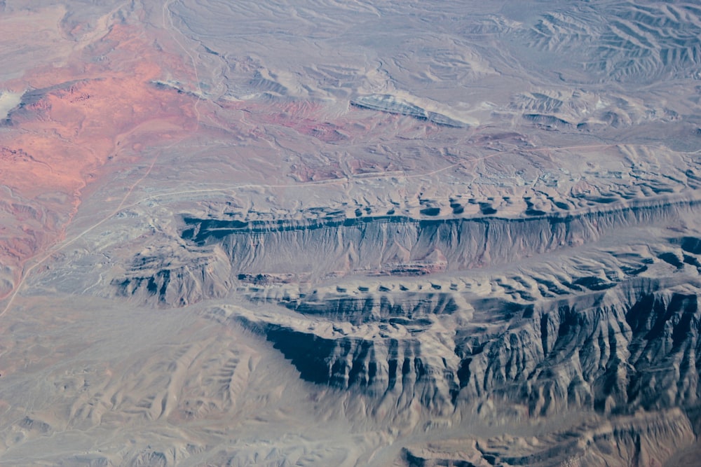 aerial view of snow covered field during daytime