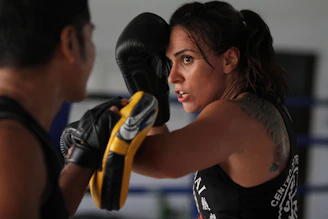 Martial artist practicing powerful strikes in a focused training session.