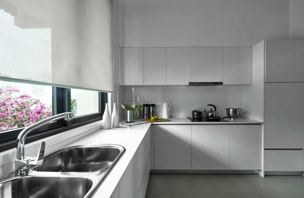 stainless steel sink near window