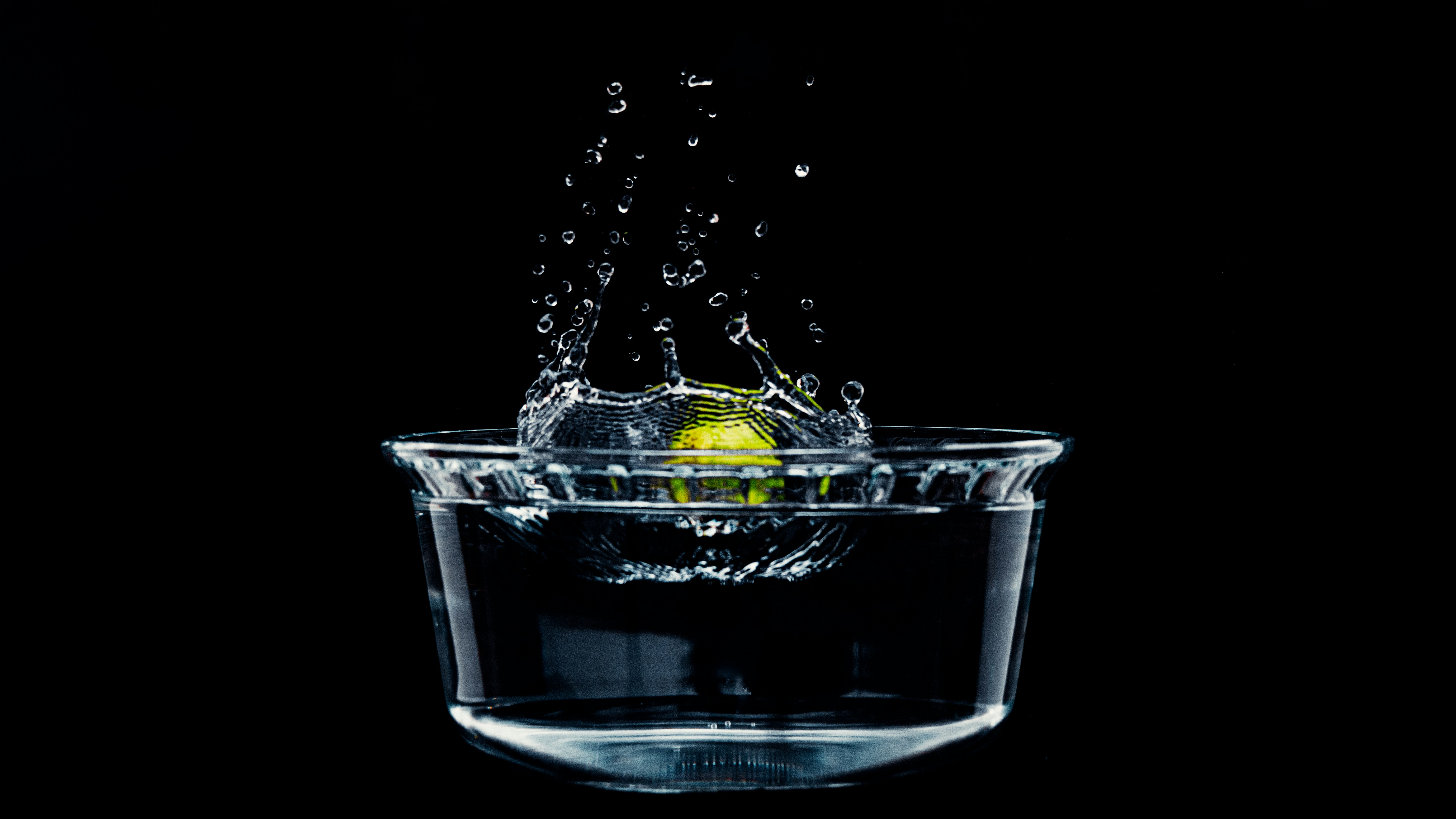 clear glass cup with water