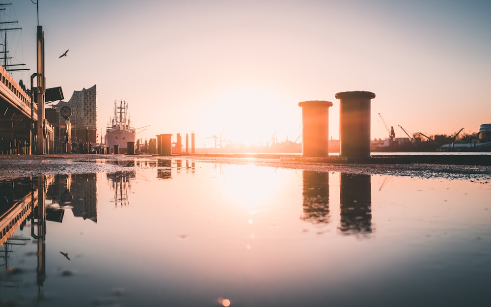 brown and white concrete building on water