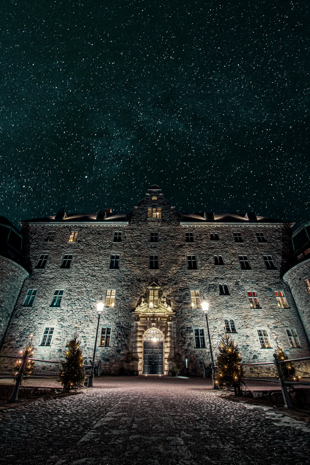 brown concrete castle during night time