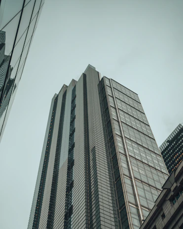 A high-rise building representing urban investment opportunities.