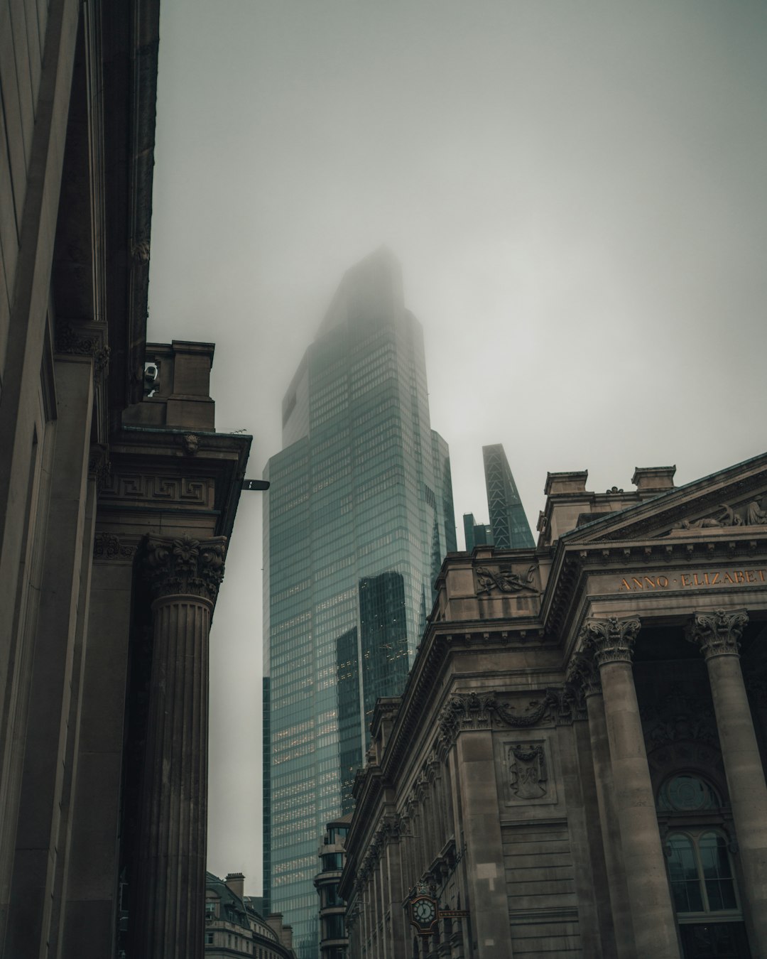 brown concrete building under white sky during daytime