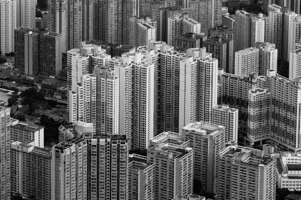 a black and white photo of tall buildings