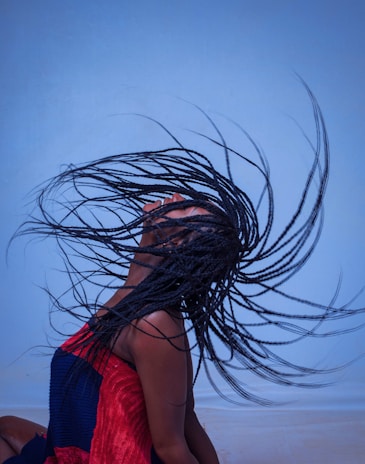 woman in red tank top