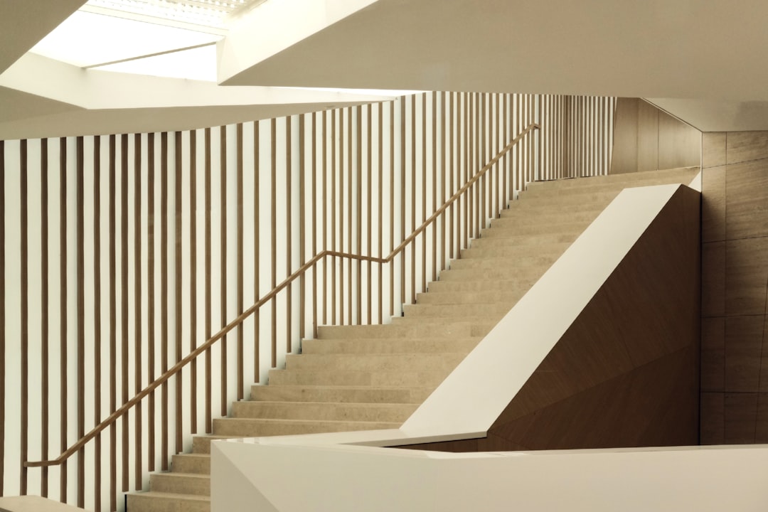 white and brown concrete staircase,