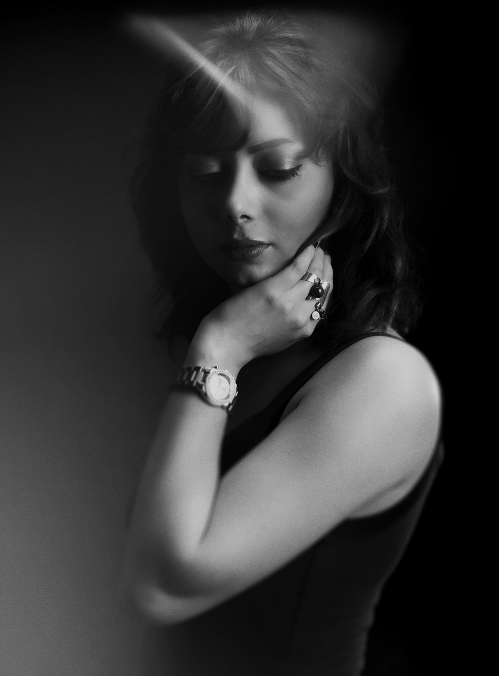 woman in tank top with silver ring